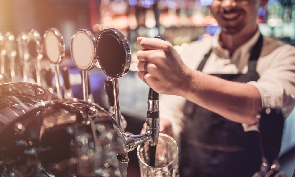 Man on working holiday in bar tax