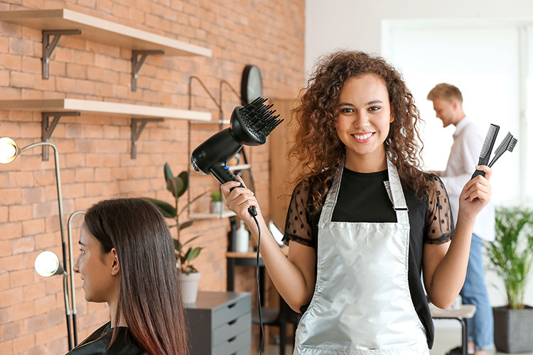 hairdresser with beauty accessories