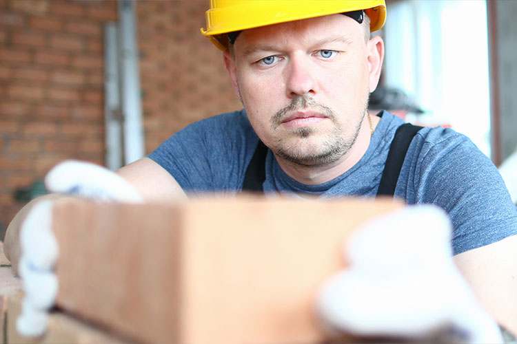 tax-return-construction-worker-checklist construction worker bricks tax