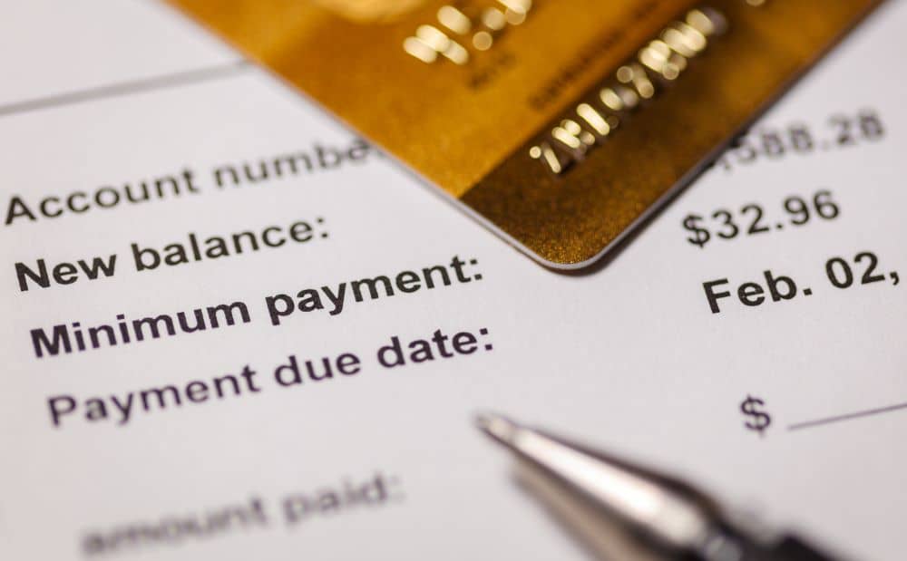 Credit card bill showing minimum payment require.