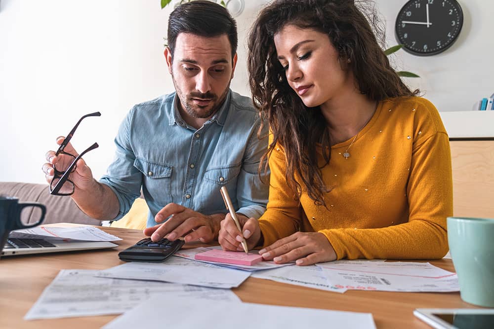 couple working out expenses and finances