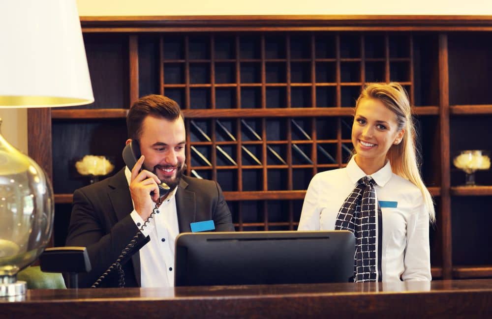 Hotel front desk staff.