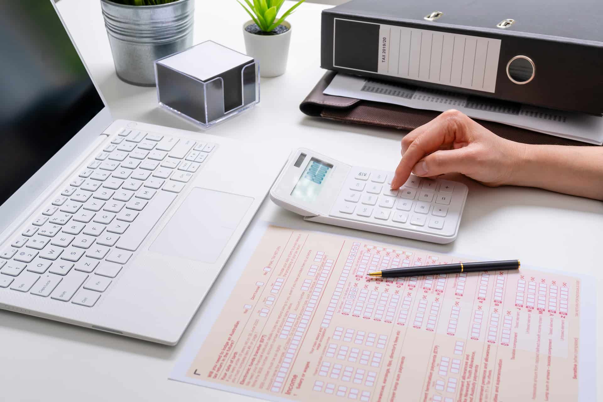 Person wondering what are the new tax cuts while doing return